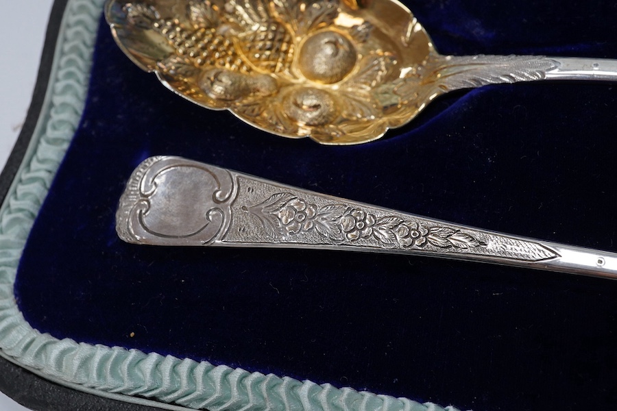 A cased pair of George III silver Old English pattern 'berry' spoons, by Joseph Ash I, London, 1810, 21.2cm, 2.9oz. Condition - fair to good